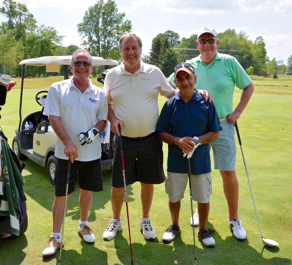 4 golfers & cart